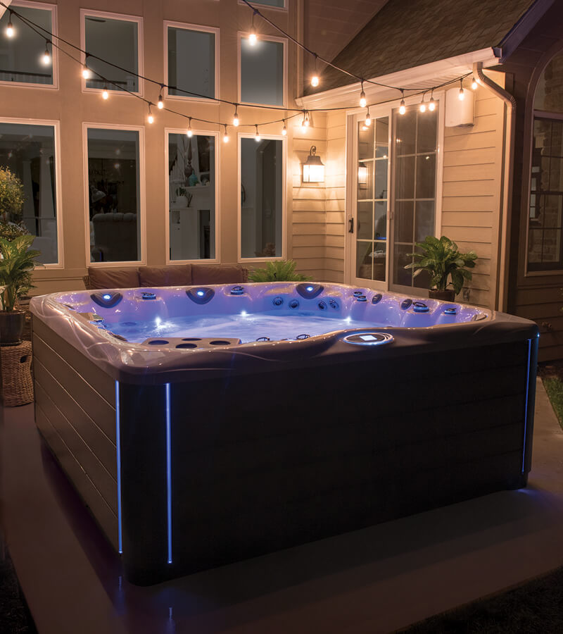 Beautiful hot tub lights set the scene for relaxing in a Master Spas hot tub